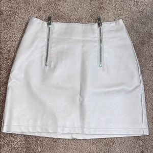 Cream colored mini skirt